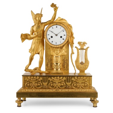 Каминные часы «Амур-победитель с кифарой»